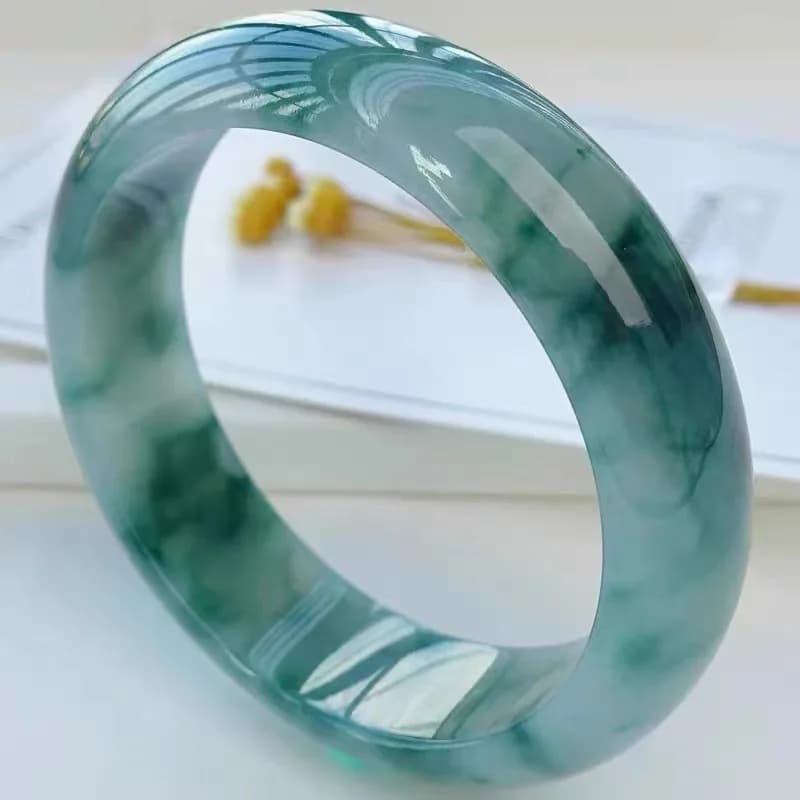 Ice Jadeite Bracelet from Myanmar, a gift for mom, a classic hand accessory, finely crafted with delicate floral…