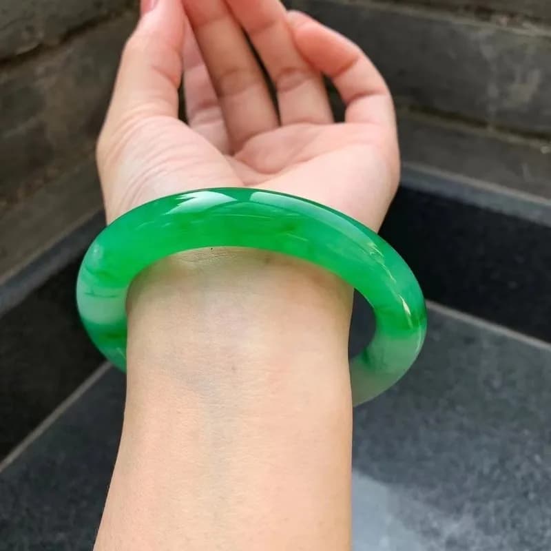 Natural Burmese jade bracelet, grade A, from an old mine, with high-quality ice-like translucency, featuring a…